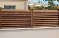 Cómo instalar paneles de madera pra vallado