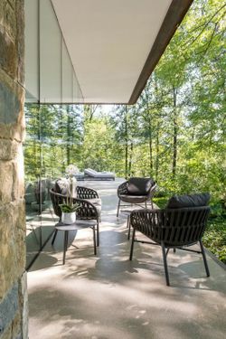 Aluminum and synthetic rope garden armchair