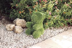 Figura decorativa Orso seduto in erba artificiale