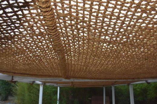 Malla sombreo de fibra de coco, protección natural y estilo